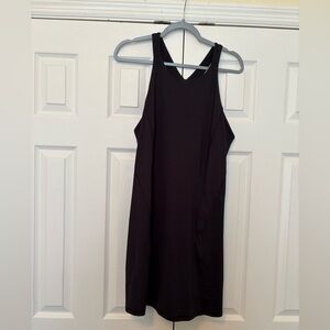 Used black athletic dress with shorts and pockets. Size XL.